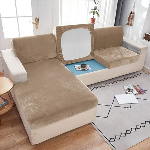housse canapé d'angle dans les teintes de beige sur un sofa à 3 assises