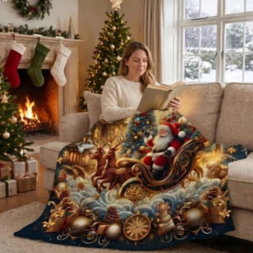 couverture avec un motif de traîneau du père noël sur une femme lisant un livre