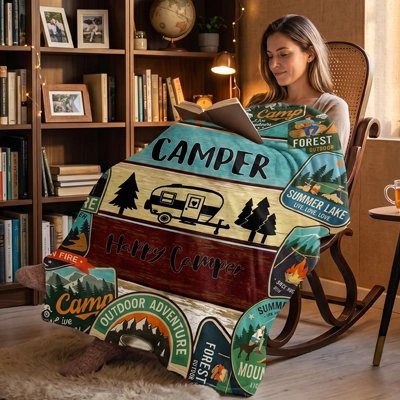 couverture sur le sujet du camping sur une femme lisant un livre sur un chaise berçante