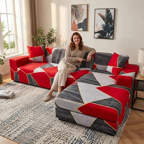 housse canape d'angle avec des figures triangulaires rouges et gris accompagnée d'une femme souriante